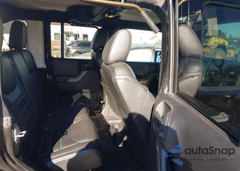 2014 Jeep Wrangler Unlimited Sport z USA, uszkodzony, nr VIN 1C4BJWDG9EL113094